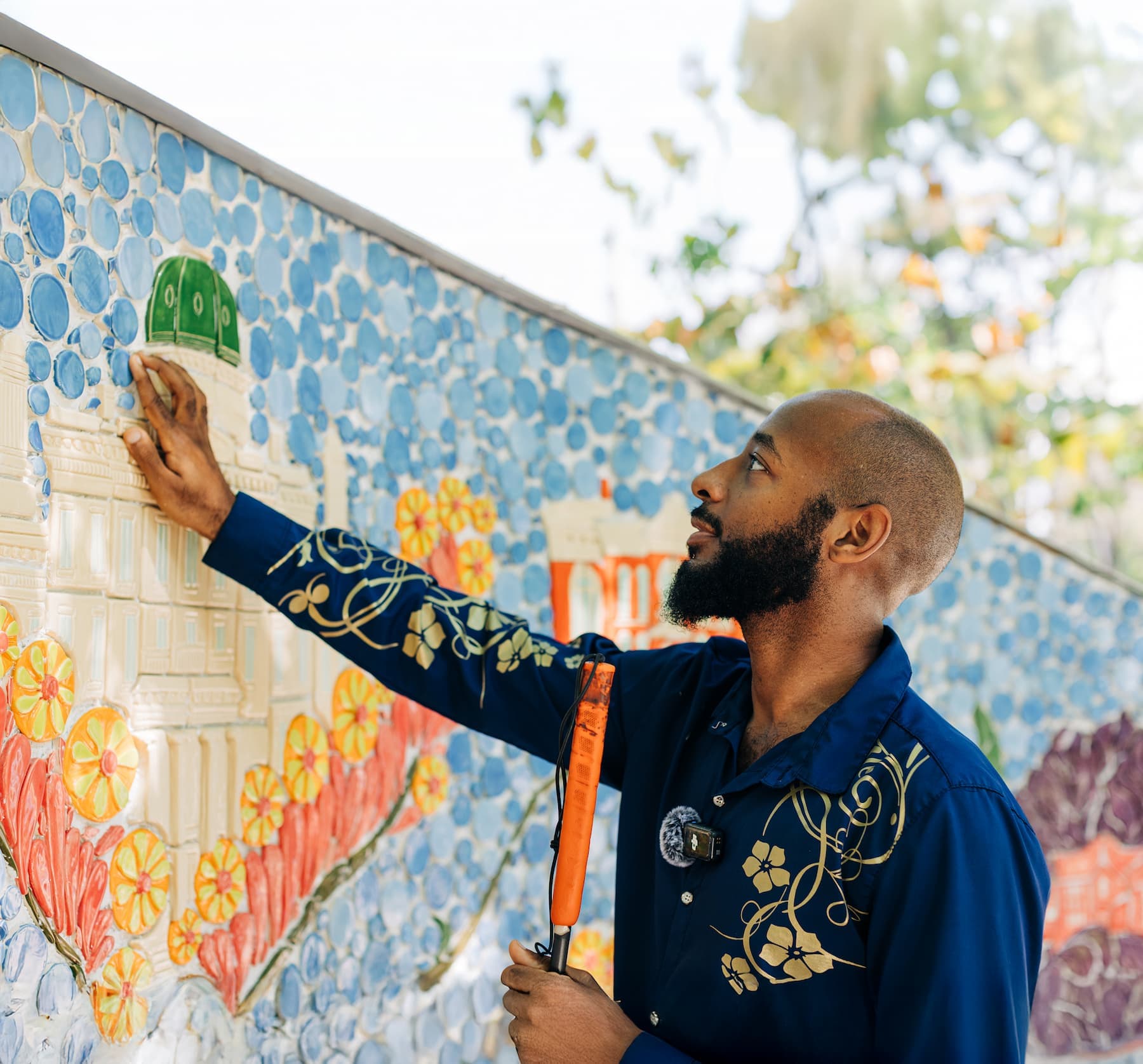 Darren Harbour touching the installation